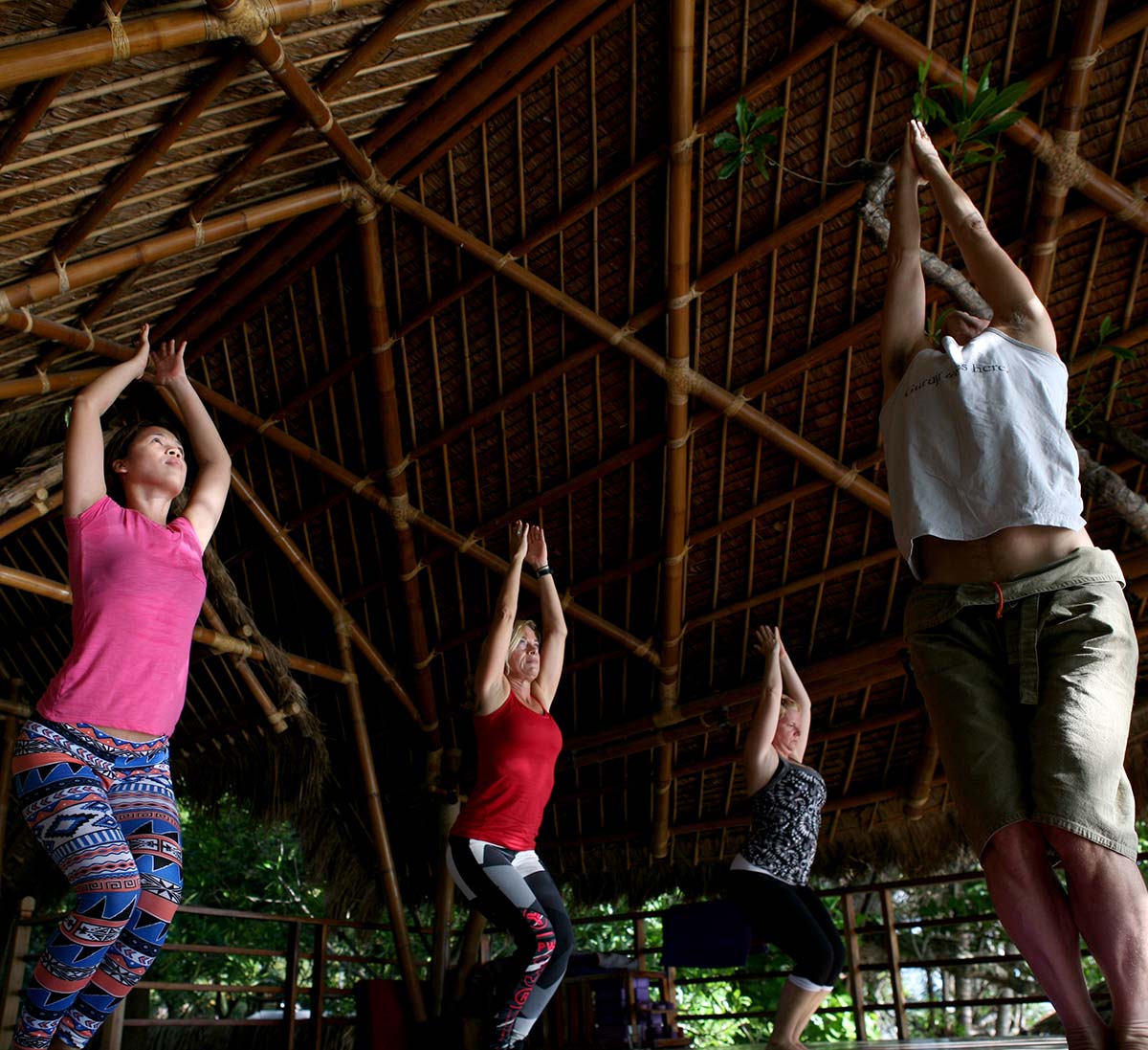 Rylyn Ge, Ulrika Kroon and Rae Collins in a yoga class with Tim Feldmann at Atmosphere Resort Philippines