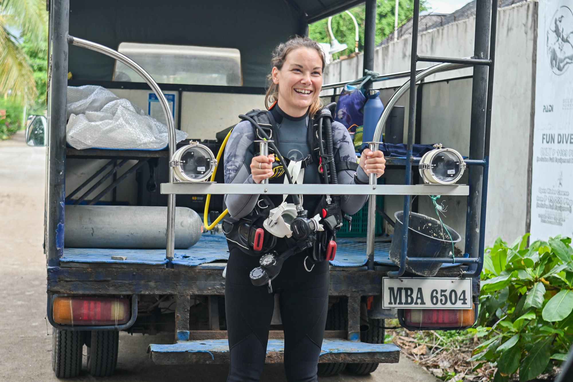 A diver holding a stereo video system used to map fish populations